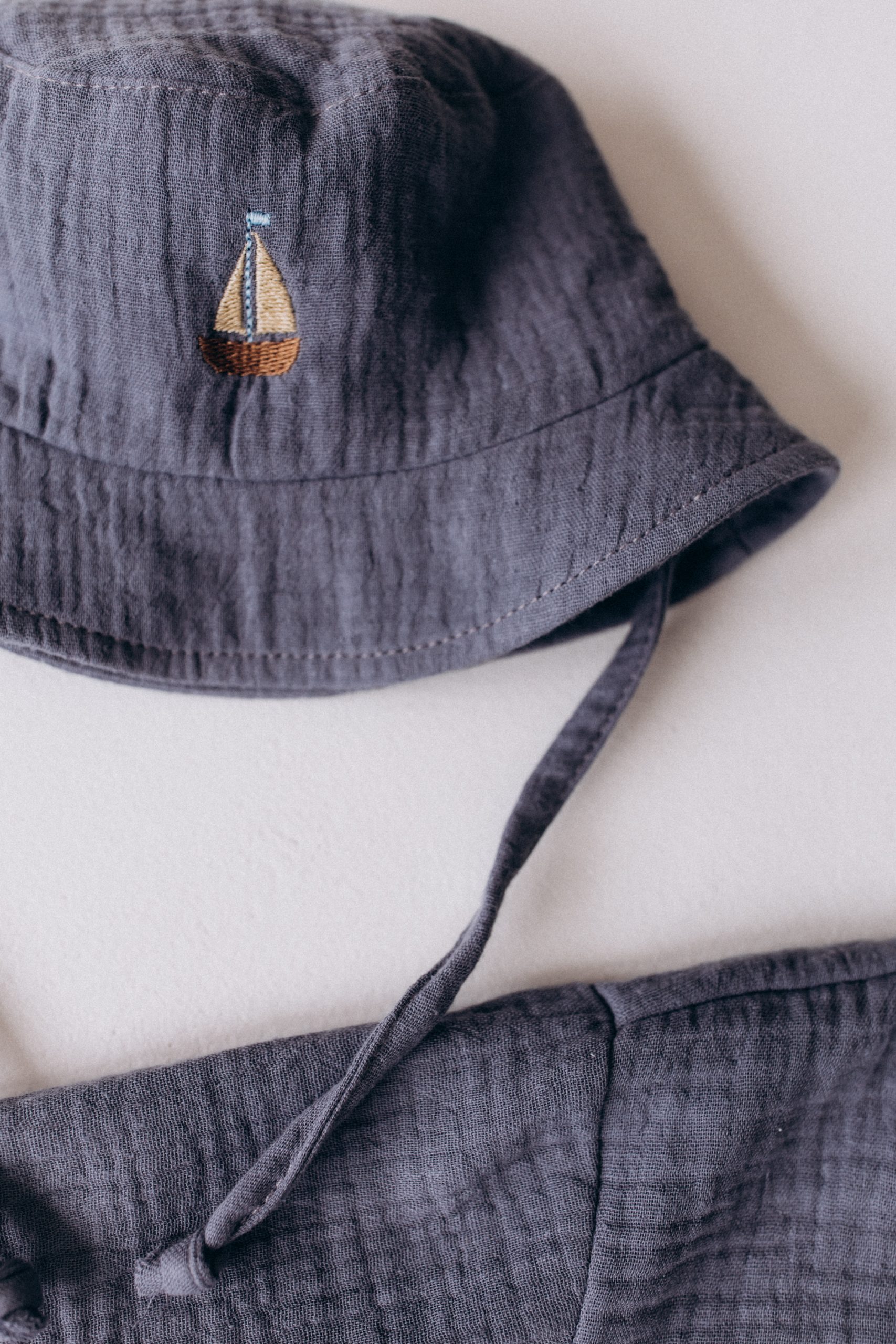 Woolly Organic Bucket Hat cappello neonato mussola barca