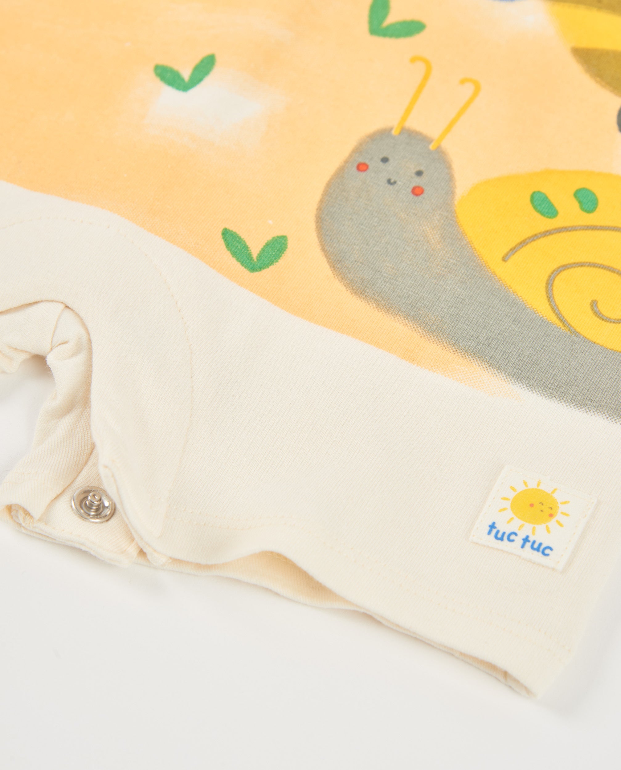 TucTuc Tutine pagliaccetto neonato beige stampa sole