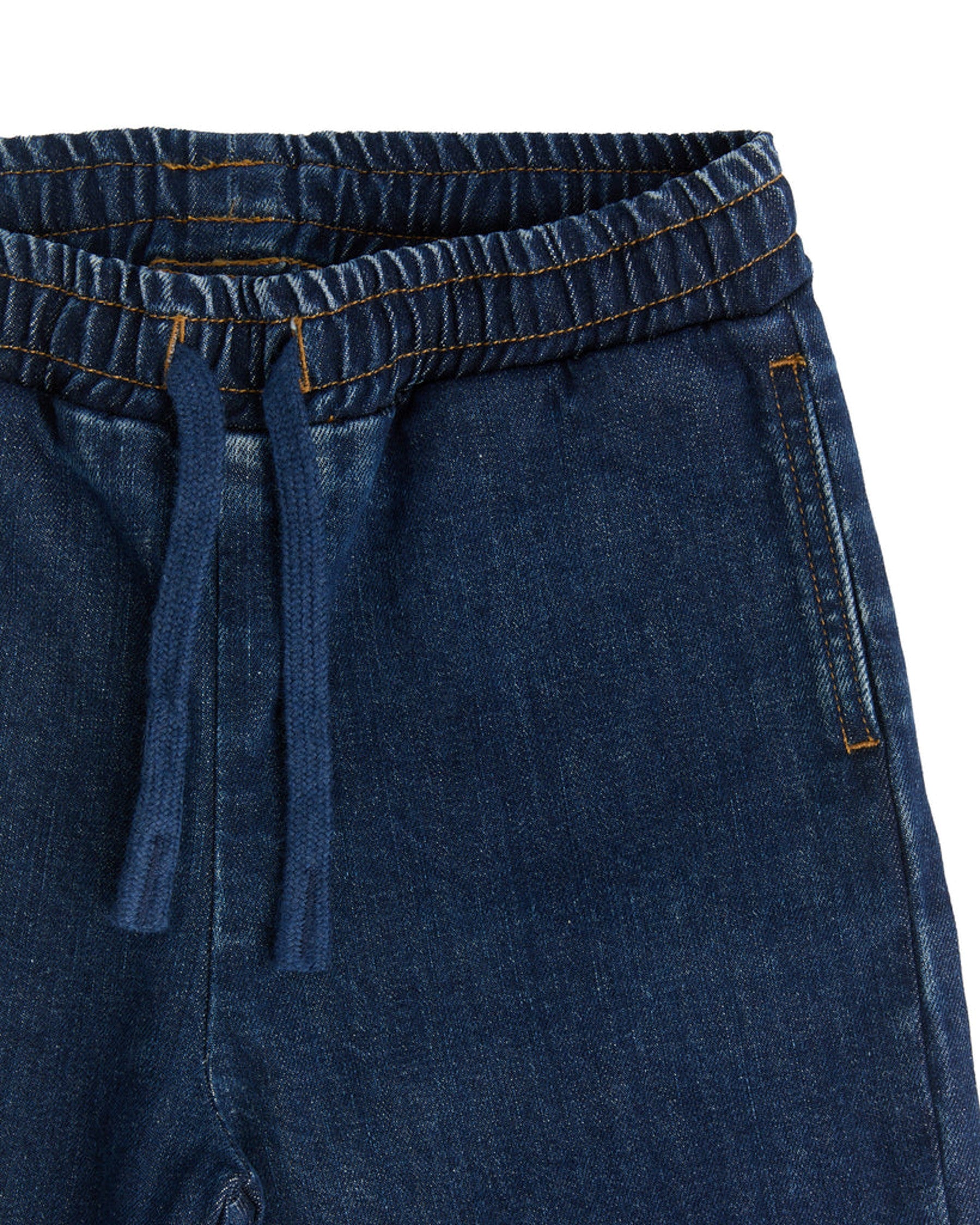 Kocarcia Leela Cotton jogger blu scura 140 cm cotone bio