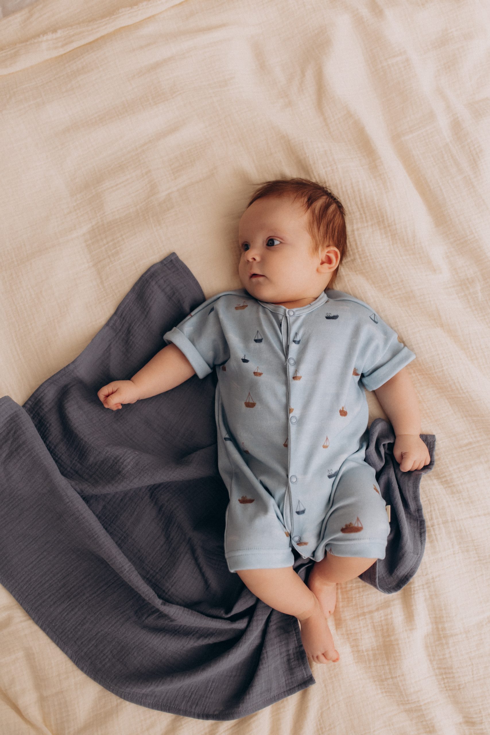 Woolly Organic Shortie SS27 pagliaccetto neonato cotone Sail to Sleep