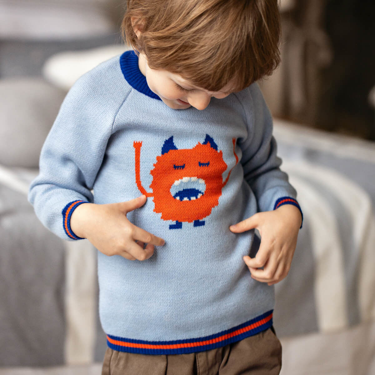 Pamboo Merino Maglione lana bambino blu mostro arancione