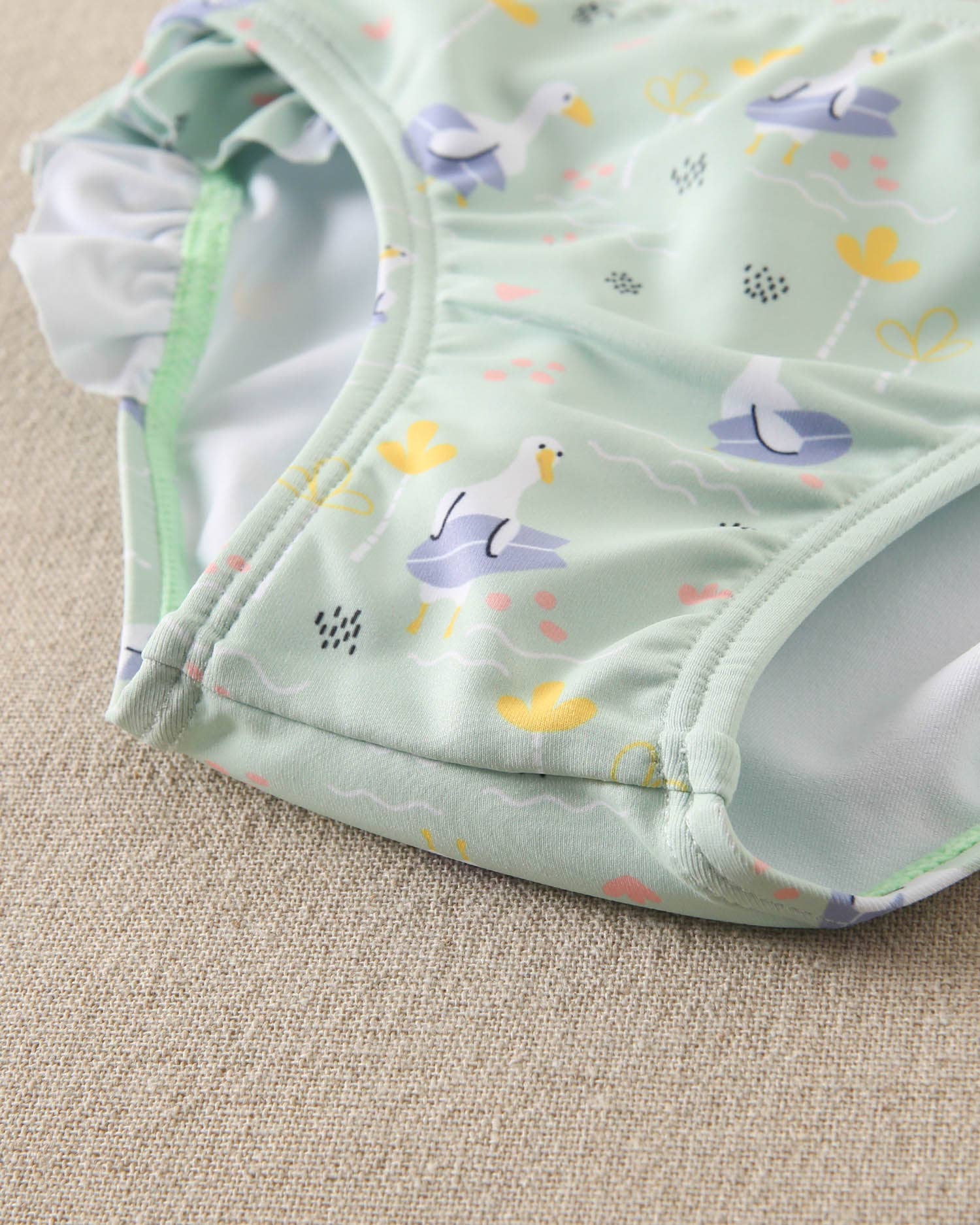 Dadati costume slip bimba oche verde acqua 18 mesi elastico