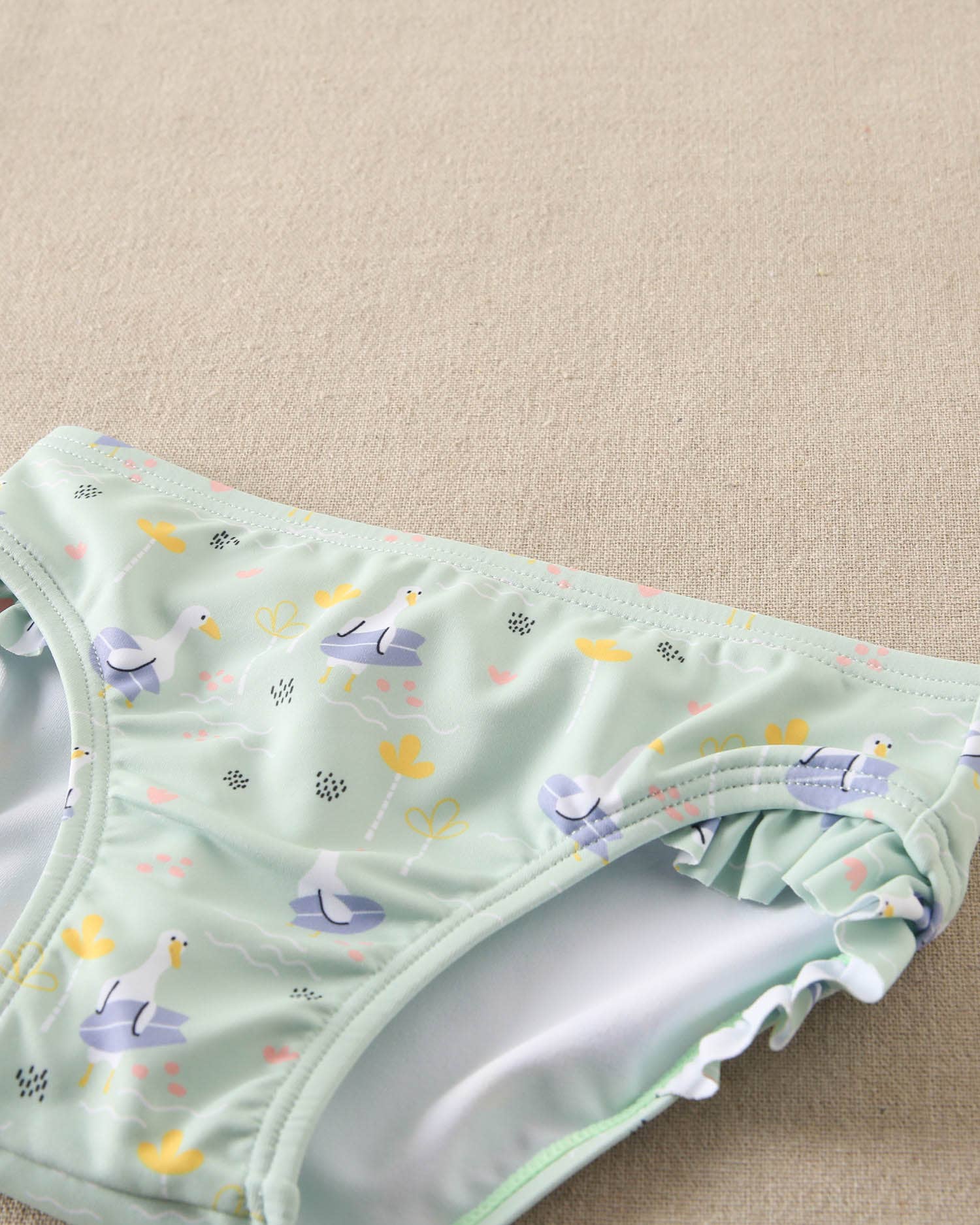 Dadati costume slip bimba oche verde acqua 18 mesi elastico