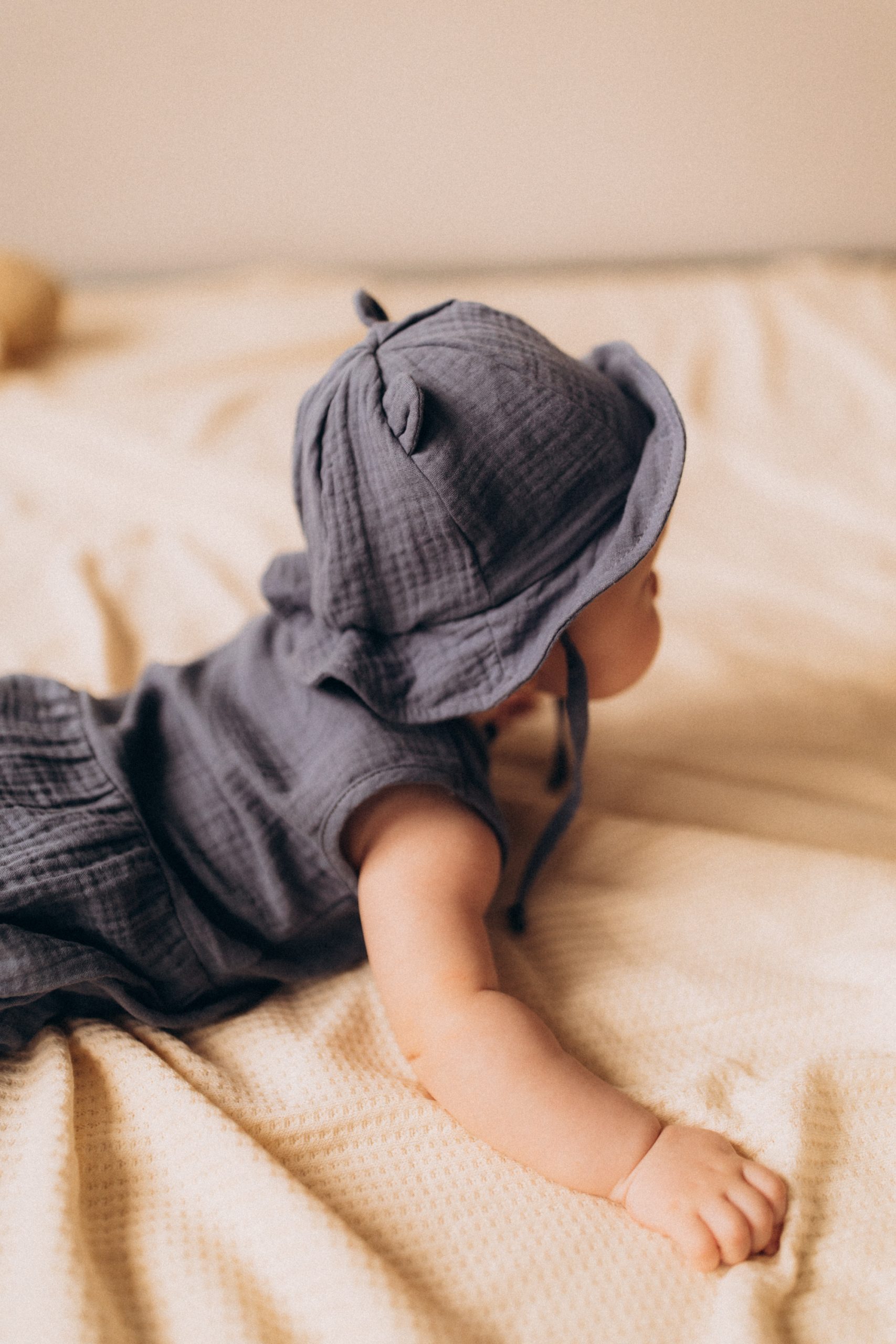 Woolly Organic Muslin cappello sole neonato orsetto cotone bio