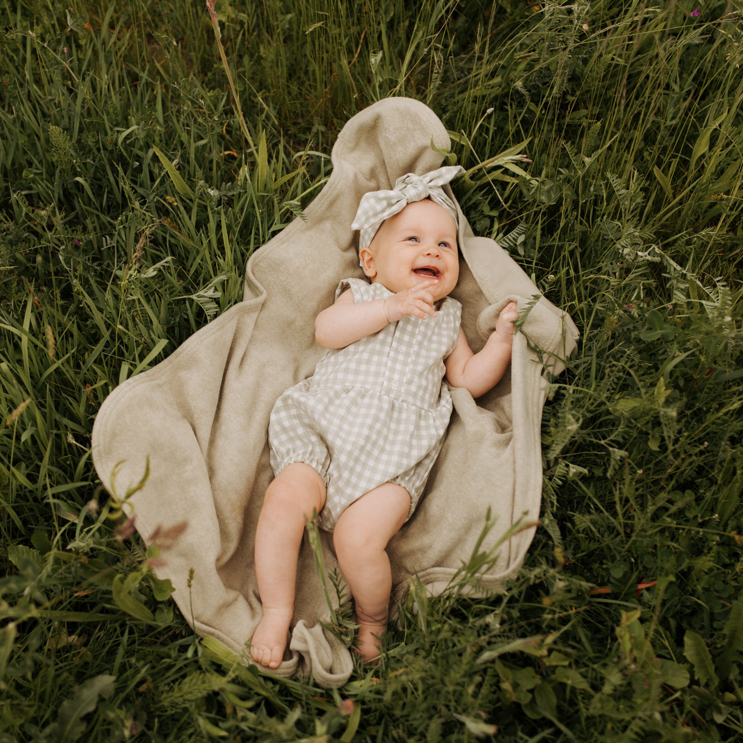 Woolly Organic Romper SS24 pagliaccetto neonato cotone riciclato