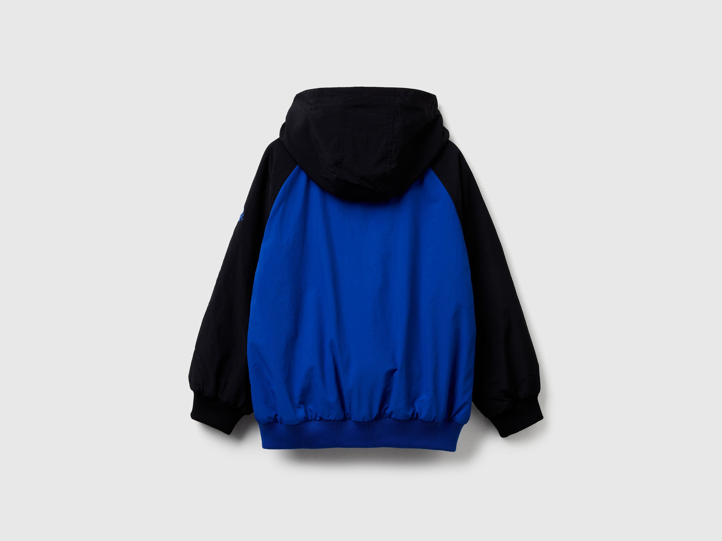 United Colors of Benetton Giacca Nylon con Cappuccio in Pile