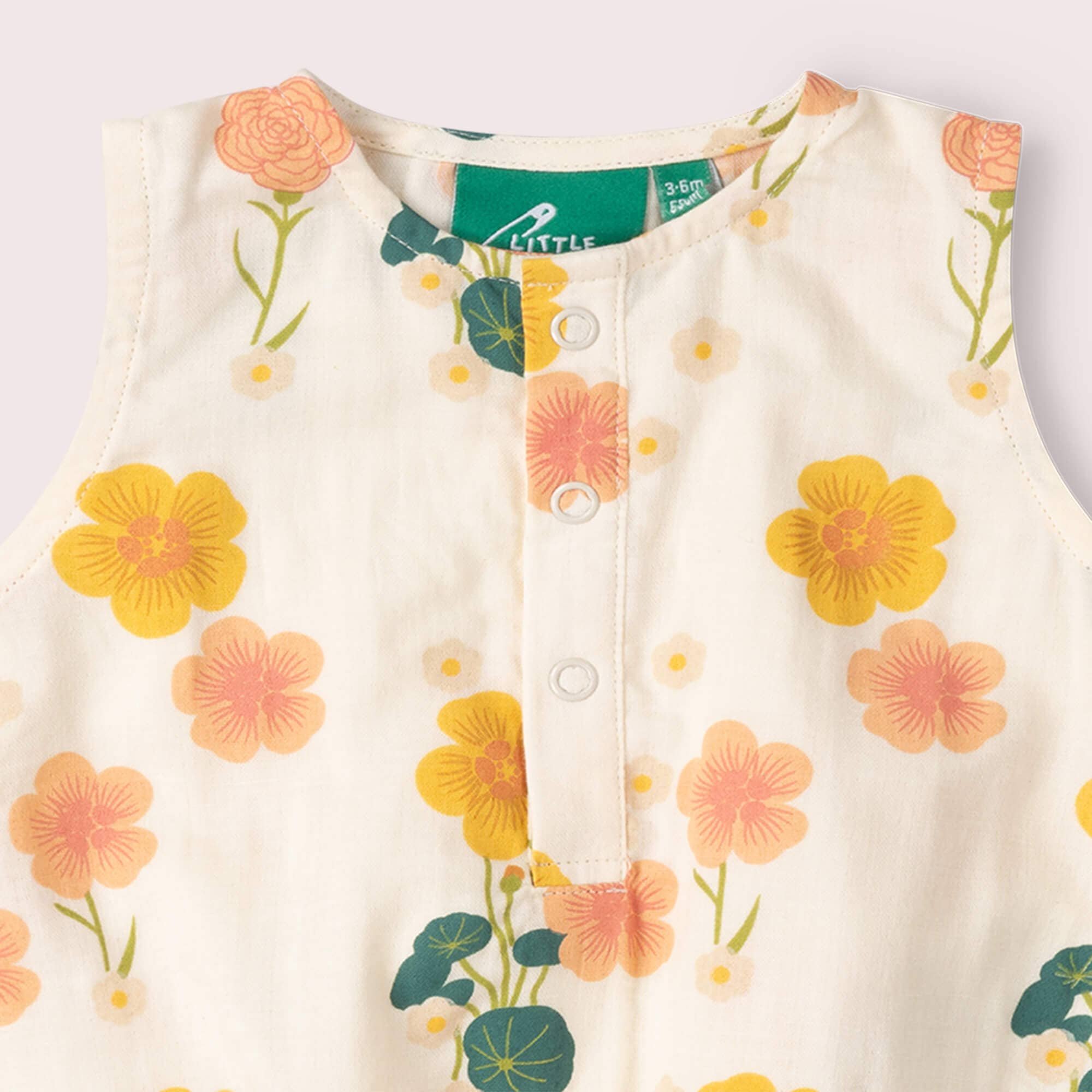 Little Green Radicals pagliaccetto flora neonato cotone bio