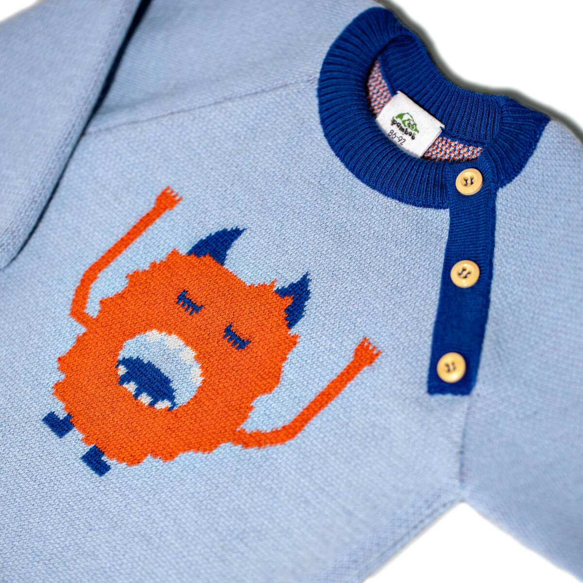 Pamboo Merino Maglione lana bambino blu mostro arancione