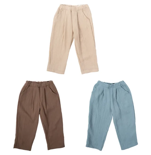 Woolly Organic SS26 Pantaloni Bimbo Mussola Cotone Bio