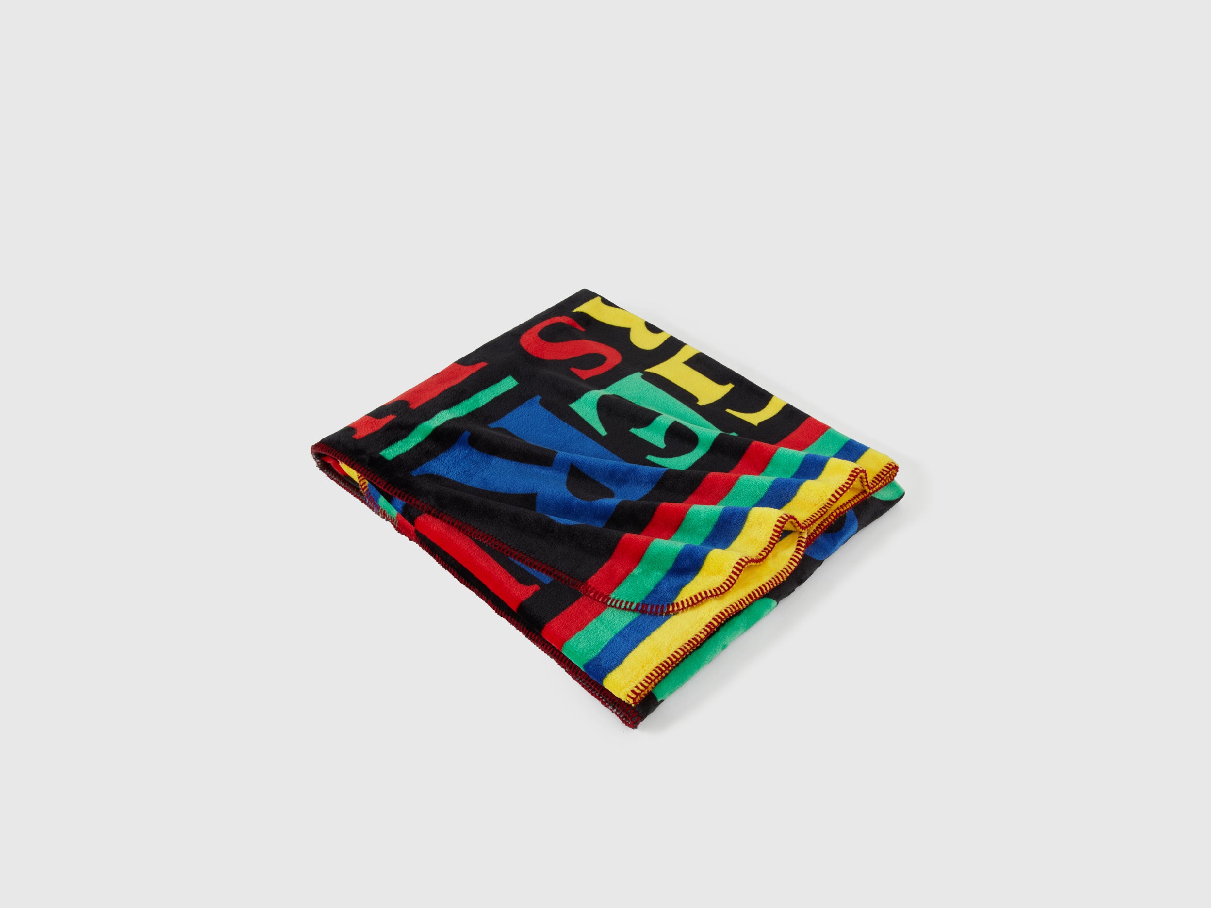United Colors of Benetton coperta pile Stranger Things scritta