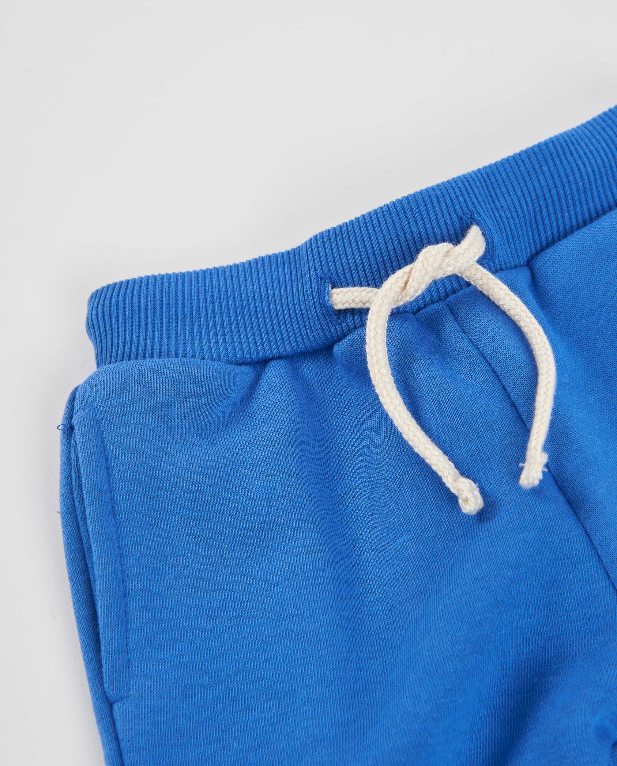 TucTuc Pantaloni tuta bambino blu felpa tasca stampa