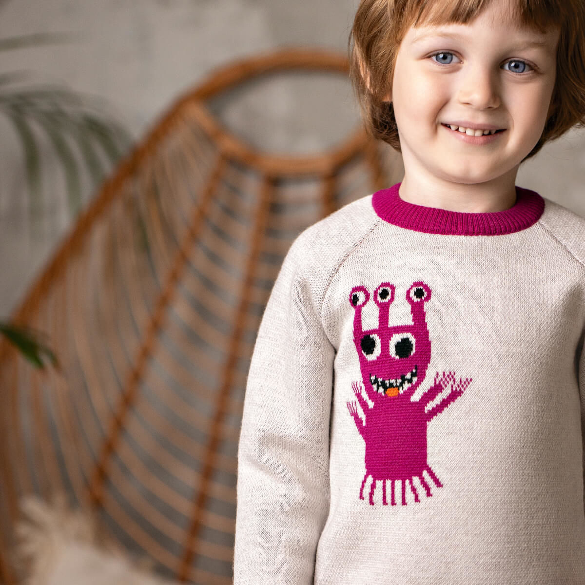 Pamboo maglione bimbo lana merino blu mostro arancione