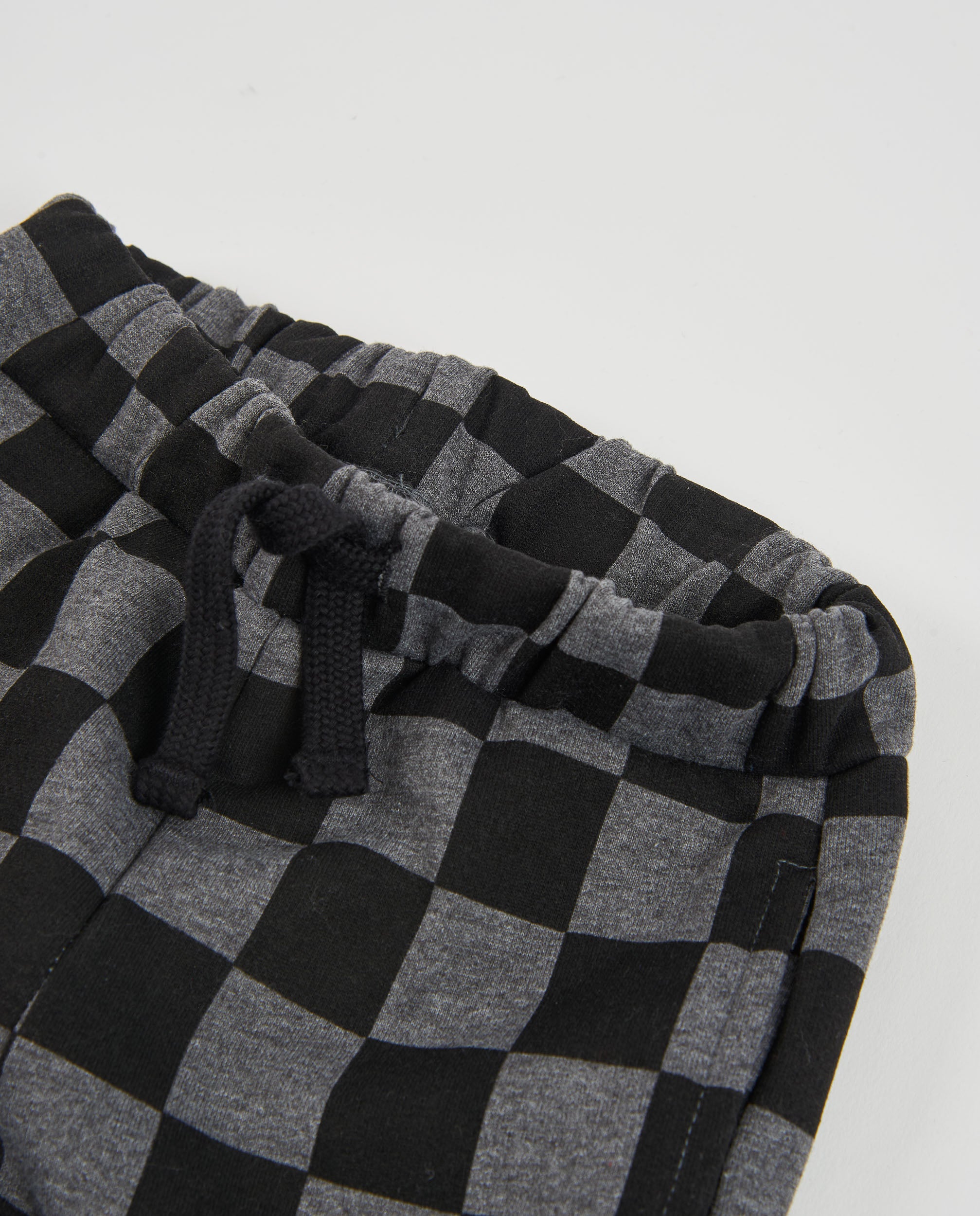 TucTuc Pantaloni felpa bambino nero stampa geometrica
