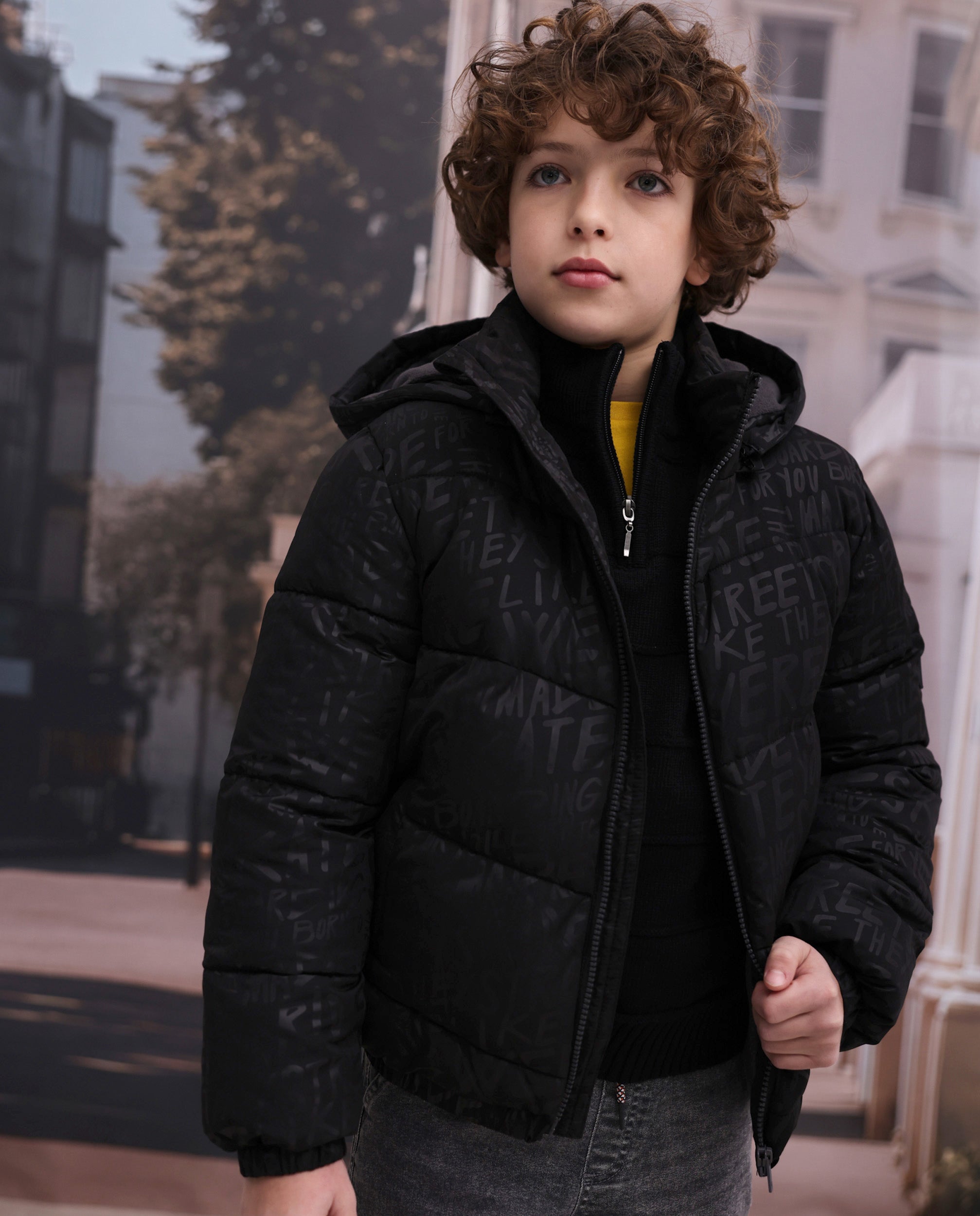 TucTuc Cappotti piumino bambino nero scritte 7 anni