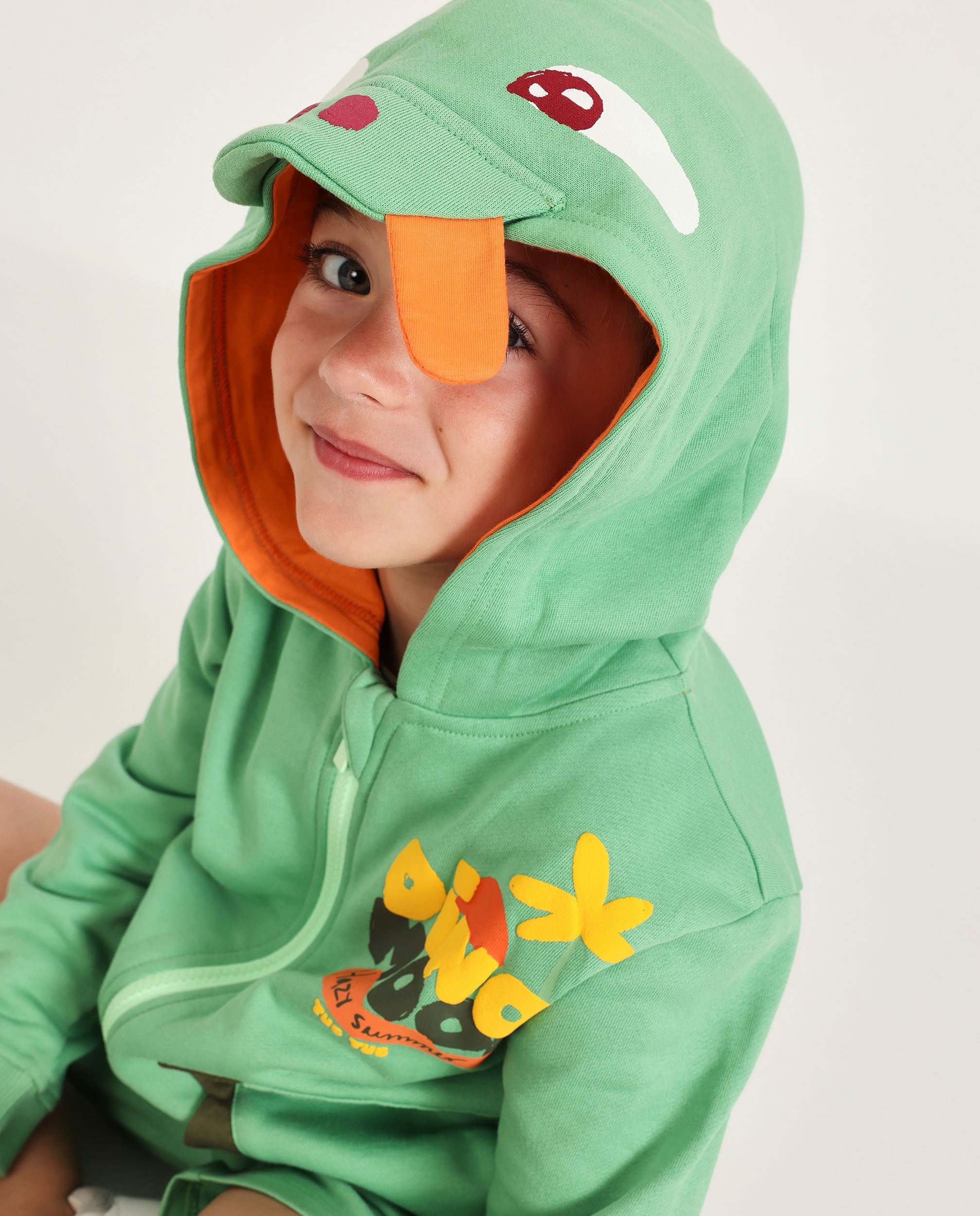 TucTuc Completi tuta bimbo cappuccio dinosauro verde