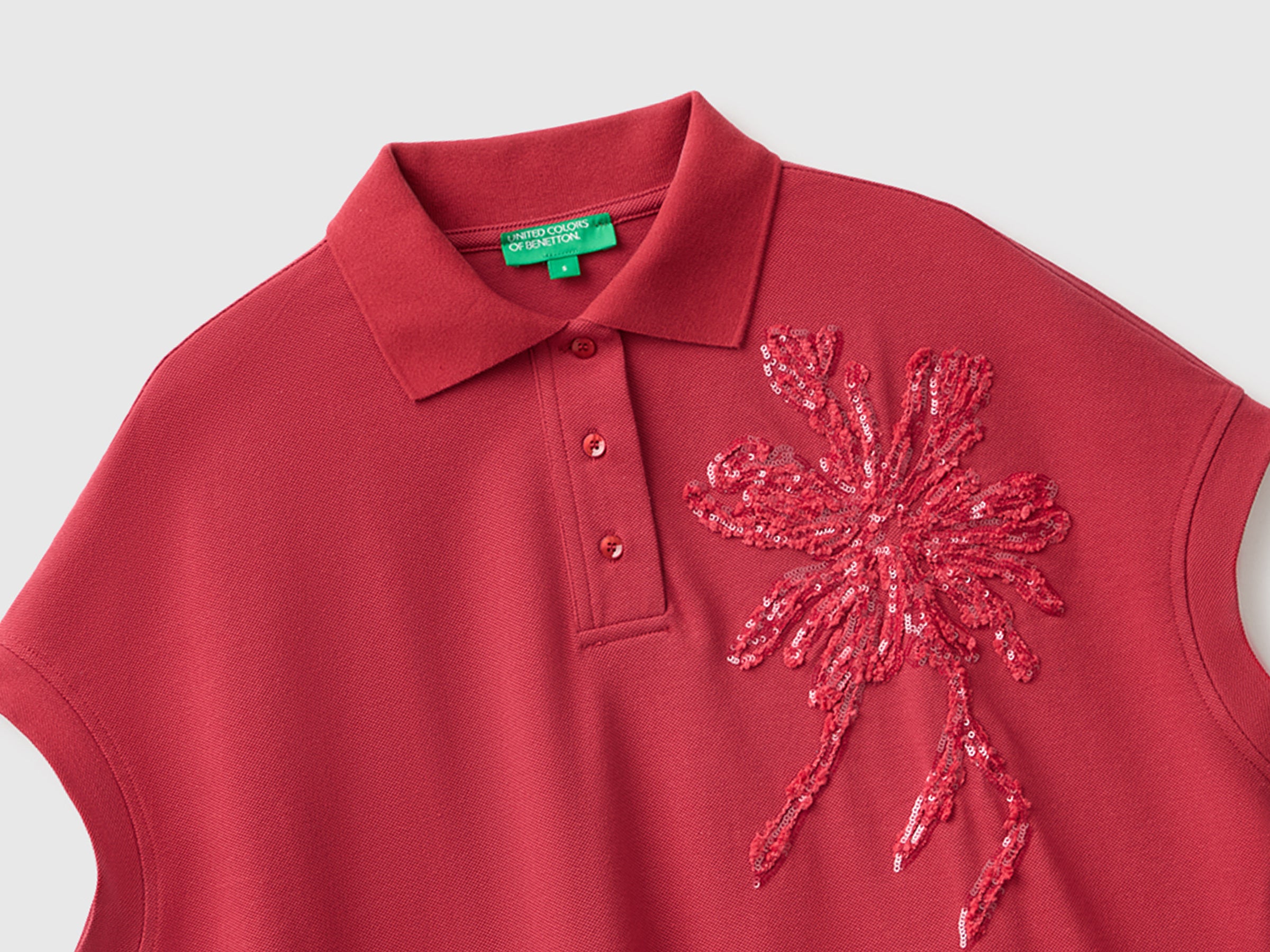 United Colors of Benetton polo smanicata cotone ricamo fiore