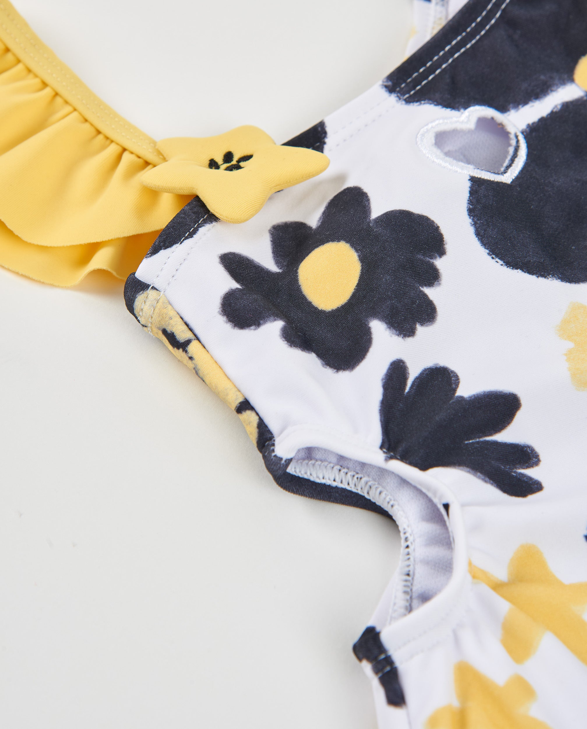 TucTuc Costumi Da Bagno costume bambina nero floreale asimmetrico
